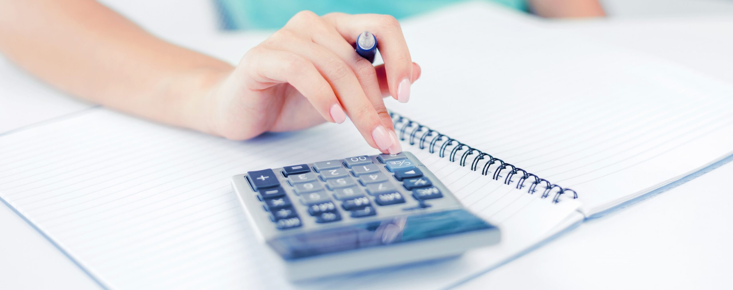 businesswoman working with calculator in office (2)