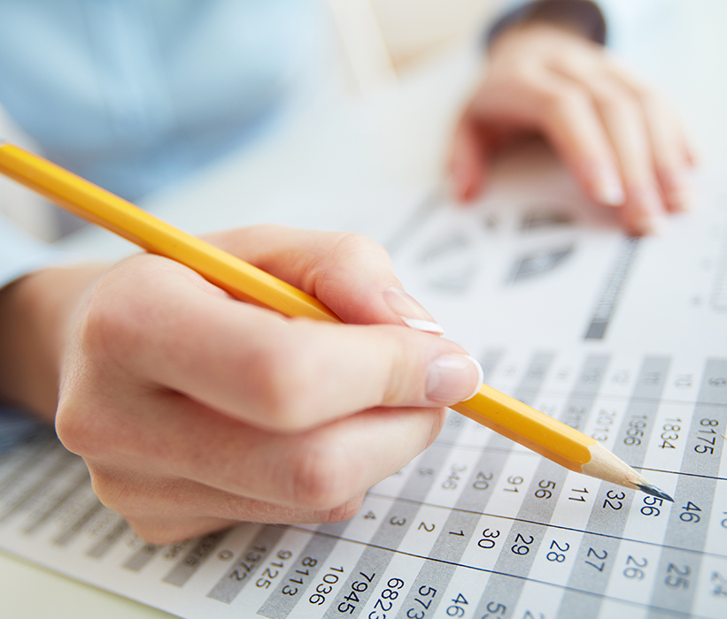Linda Carr accountant holding pencil